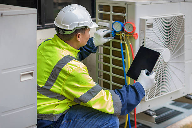 Professional Air Conditioning Repair technician working in Watertown, MA